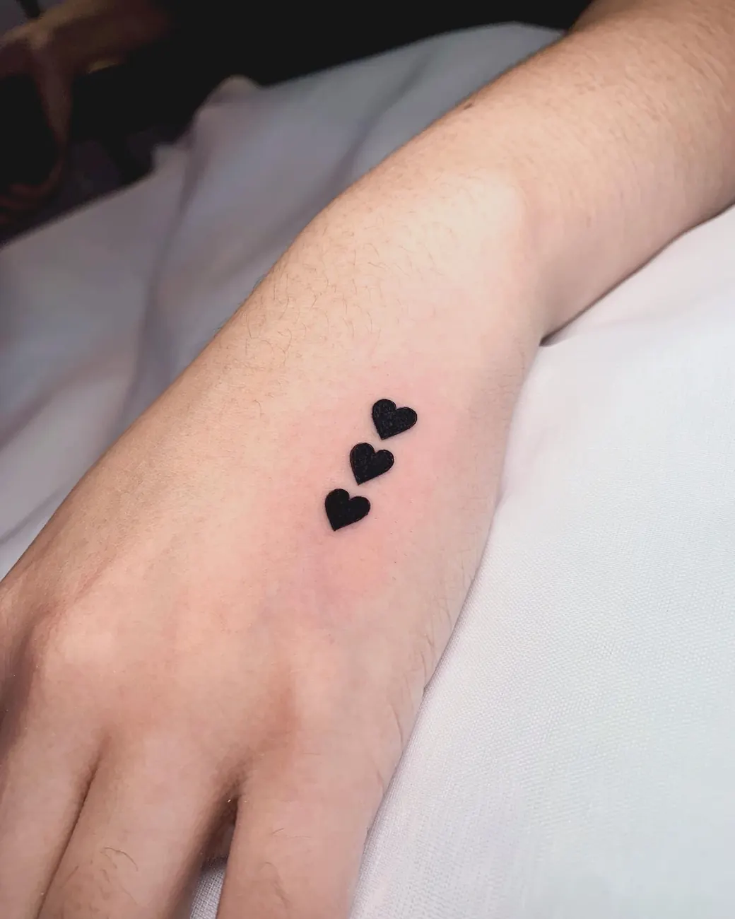 Tattoo: Hearts, hand