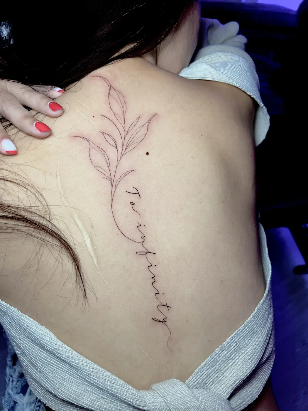 Tattoo: Branch and script, back