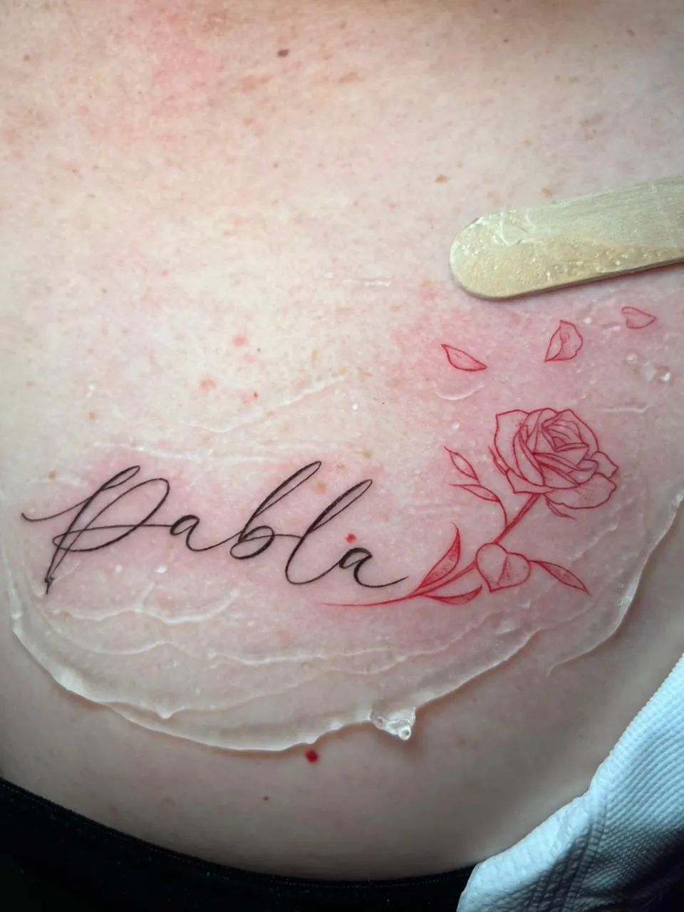 Tattoo: Name and rose in red line